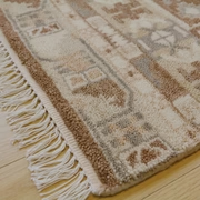 HAND-KNOTTED AREA RUG